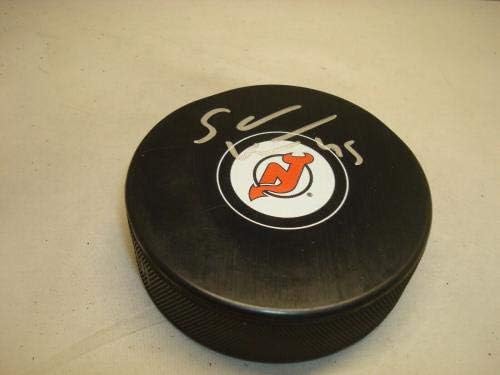 Самите Vatanen подписа хокей шайба в Ню Джърси Дэвилз с автограф от 1B - за Миене на НХЛ с автограф